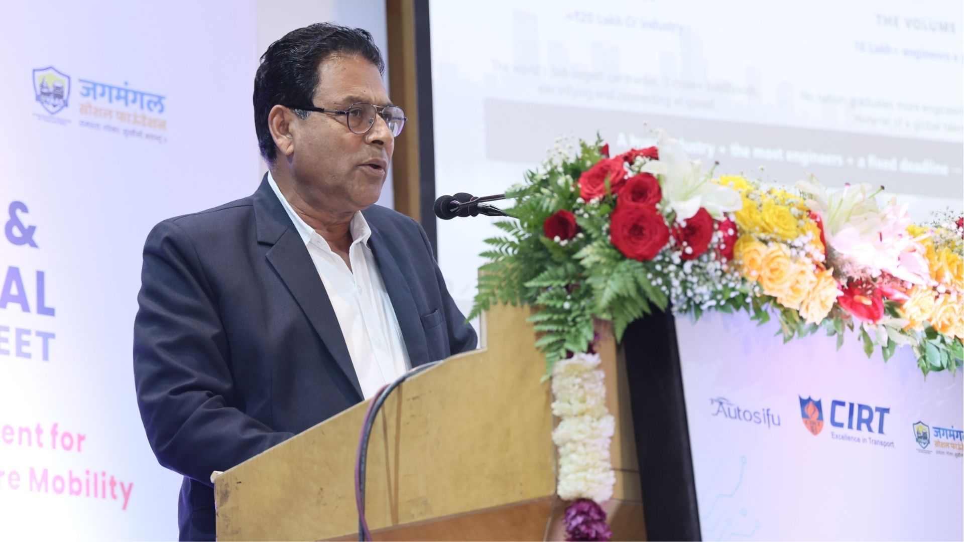 Dr. Mohan B. Waman speaking at the event