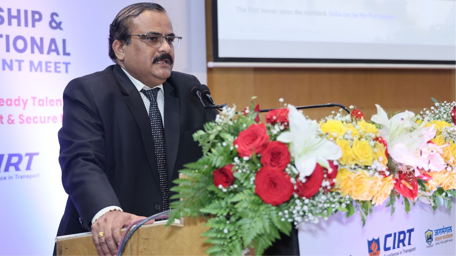 Dr. Santosh S. Sonavane speaking at the event